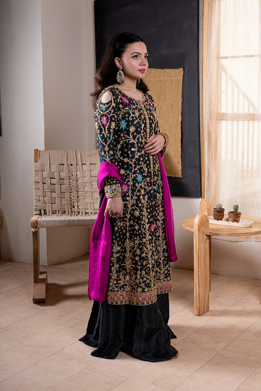 Black velvet suit side view