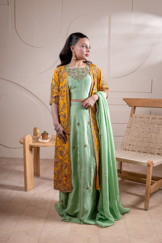 Green lehenga with yellow embroidered jacket